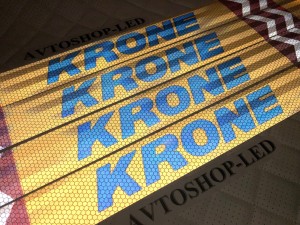 Наклейка Лента желтая светоотражающая KRONE (синяя надпись) 65 см 4 шт.