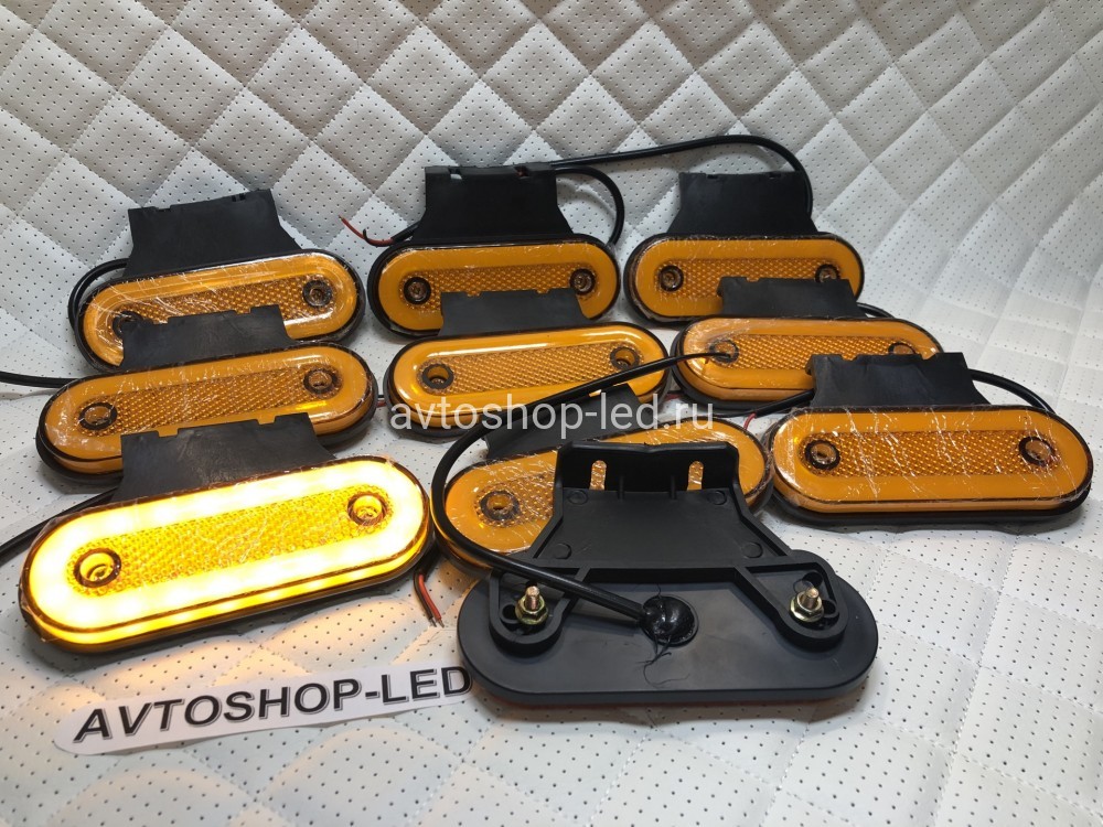 Фонари габаритные боковые Neon LЕD 12/24V с резиновым кронштейном.